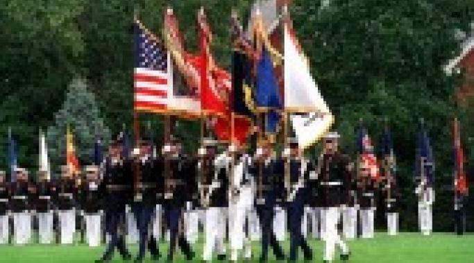 The Joint Service Color Guard advances at a ceremony. The military has seen a rise in suicide since the beginning of the War on Terror.