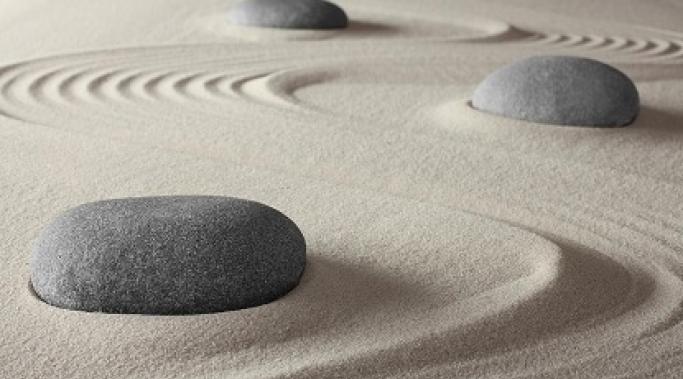 Thinking of anxiety as a rock in a Zen garden can help us calmly move around it while we work to make anxiety disappear.