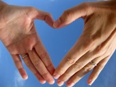 Leon Brocard's photo of two hands forming a heart shape symbolizes love.