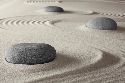 Thinking of anxiety as a rock in a Zen garden can help us calmly move around it while we work to make anxiety disappear.